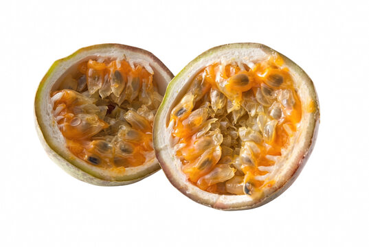 Two Halves of Ripe Passion Fruit Revealing Seeds and Pulp