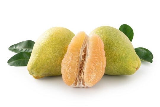 Fresh pomelo fruit with leaf isolated on white background with clipping path.