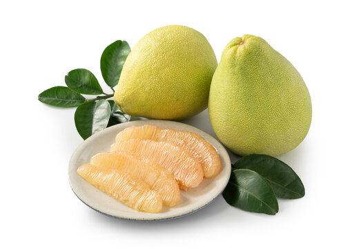 Fresh pomelo fruit with leaf isolated on white background with clipping path.