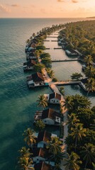 Fototapeta premium Aerial view of coastal village with wooden houses built on water. Tropical palm trees surround calm lagoon during golden sunset. Remote island community architecture sits along ocean shore under warm