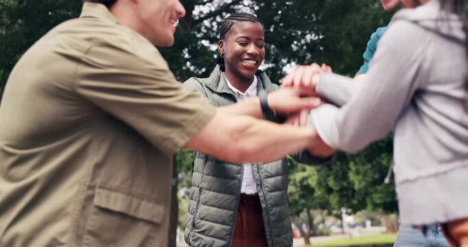 Happy, woman and friends with stack at park for social inclusion, solidarity and shared success. Circle, people and pile with celebration for friendship achievement, belonging huddle and group spirit