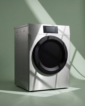 Blank stainless steel washing machine mockup on pastel green background