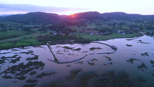 Aerial drone view of the marshes in Escalante in the Marismas de Santo&ntilde;a, Victoria y Joyel Natural Park. Cantabrian Sea. Santo&ntilde;a, Cantabria, Spain, Europe