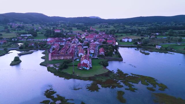 Aerial drone view of the marshes in Escalante in the Marismas de Santo&ntilde;a, Victoria y Joyel Natural Park. Cantabrian Sea. Santo&ntilde;a, Cantabria, Spain, Europe