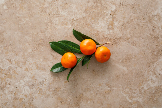 Mandarins fresh citrus fruit with green leaves