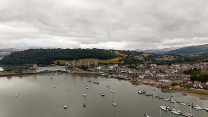 Aerial Photo Conway Wales. Conwy , previously known in English as Conway, is a walled market town, community and the administrative centre of Conwy County Borough in North Wales. © Brian