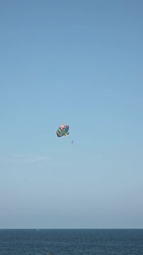 Parasailing Above the Mediterranean Sea Along Alicante Coast, Spain