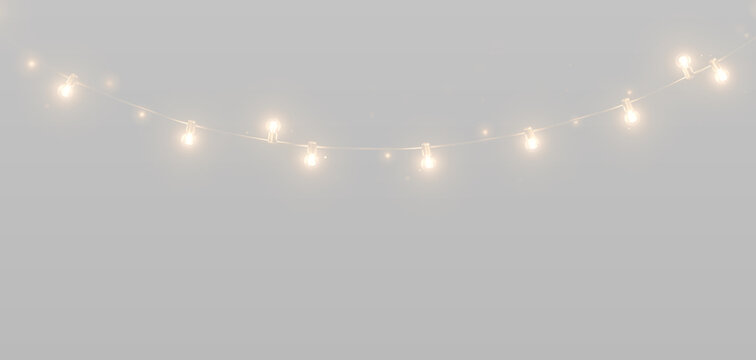 Golden light garland with glowing bulbs and curved cable.