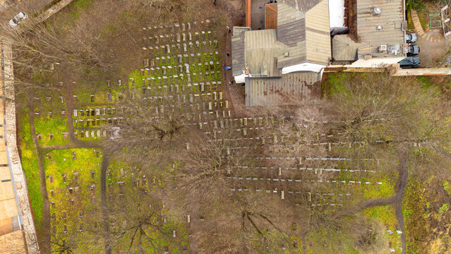 Top-down aerial drone view of the historic Remah Jewish Cemetery and Synagogue in Kazimierz Krakow Poland