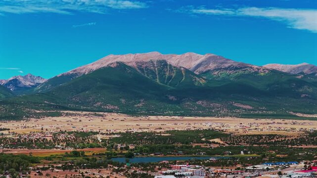 Collegiate Peaks Mount Yale Mt Columbia fourteener peaks Buena Vista Rocky Mountains drone aerial Colorado nature landscape Aspen Cottonwood Pass Summer Fall foliage morning blue sky pan left motion