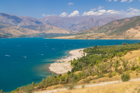 Lake Charvak, a reservoir and popular summer holiday destination in the Tien Shan mountains, Uzbekistan 