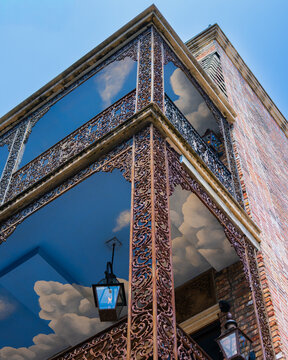 Ornate Historic Building Facade with Decorative Iron Balconies