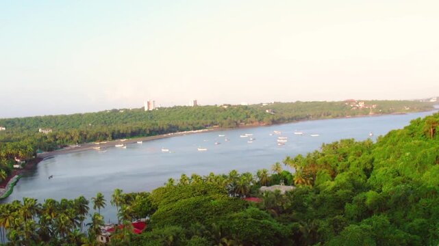 Aerial view of vagator beach in goa india featuring lush green