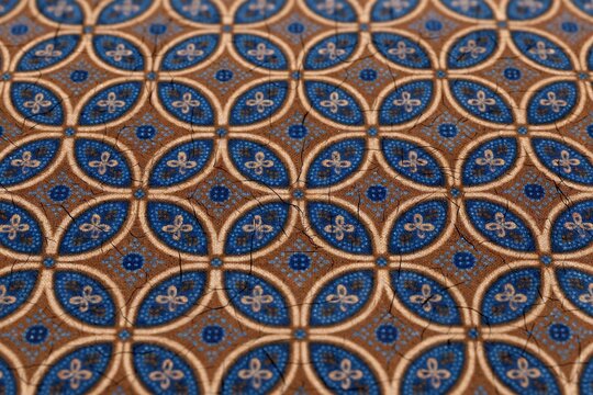 Indonesian Batik Kawung Traditional Fabric Pattern Blue Brown Close Up Texture White Background