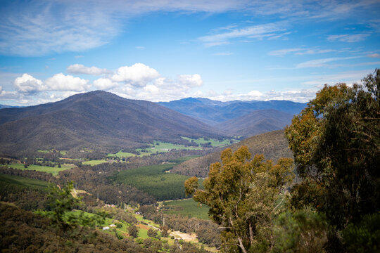 Scenic Mountain Valley Landscape Under Blue Sky