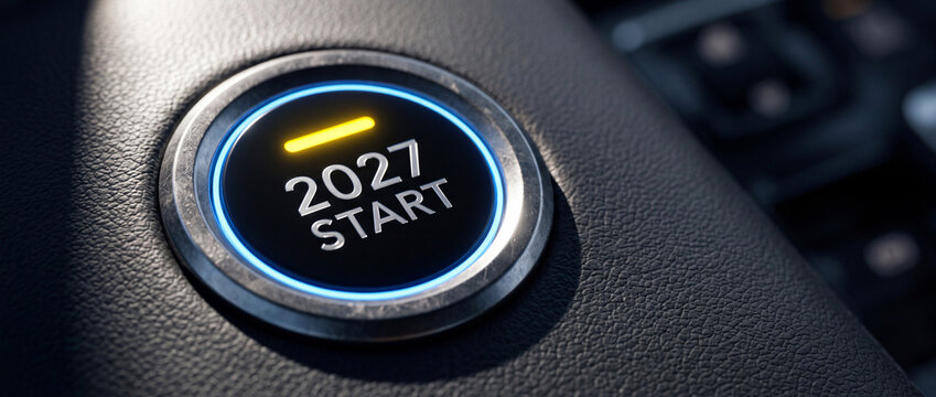 Car start button with 2027 text glowing on modern vehicle dashboard interior