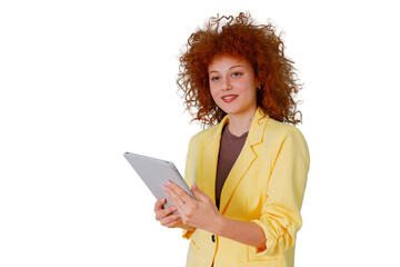Young smiling woman with curly red hair holding a tablet, communicating and interacting with technology on a transparent background © Komora