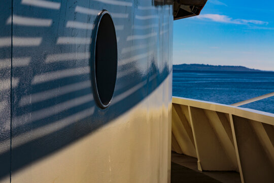 Porthole and upper deck of a Puget Sound ferry near Seattle.