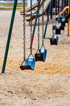 Childrens swings in a play area in Manito Park, Spokane.