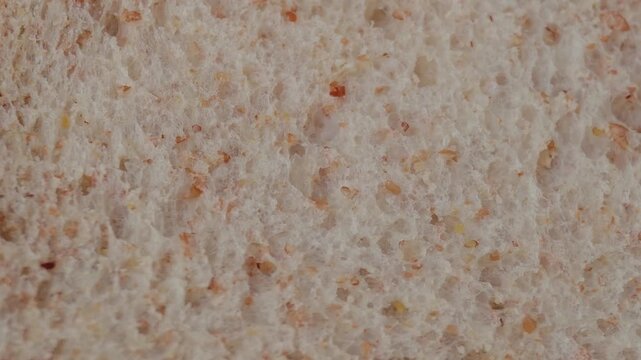 Whole wheat bread on wooden plate