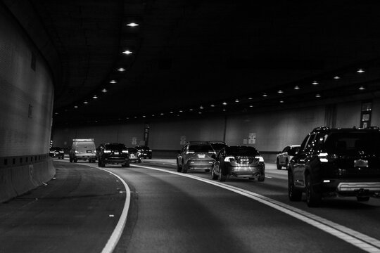 Wet roadway and traffic in the Interstate 90 tunnel in Seattle