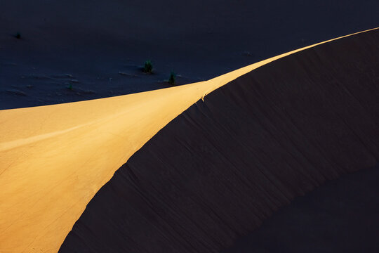 Light and shade, the landscape of the sand dunes,  slopes and shadows.