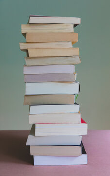 Pile of balancing paperbook books
