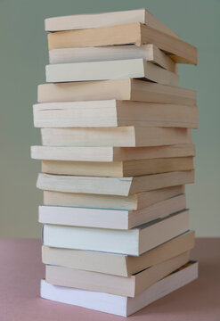Pile of balancing paperbook books