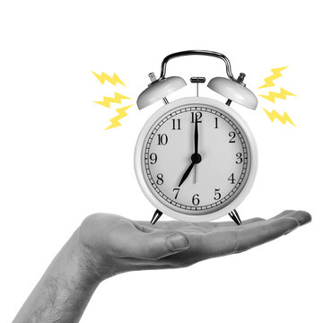 A hand holds an alarm clock that is ringing. The clock shows a specific time. Lightning bolts surround the clock to indicate sound. The background is transparent.