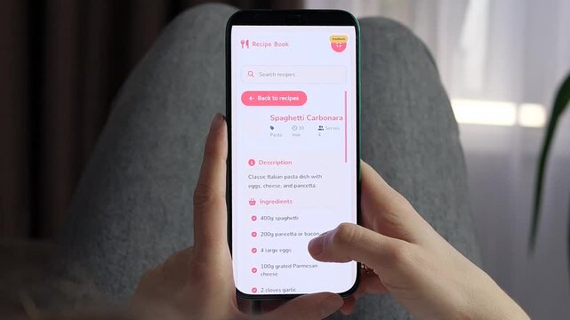 Person browses a mobile recipe app and opens a pasta recipe, highlighting digital meal planning, home cooking, ingredient lists and everyday food inspiration.