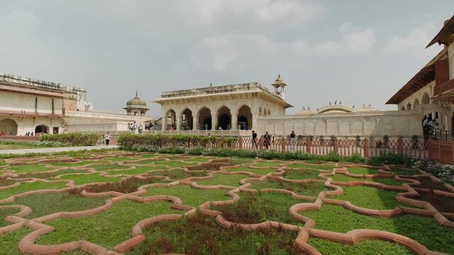 Tourists visiting anguri bagh garden and diwan i khas at agra fort, a unesco world heritage site in uttar pradesh, india
