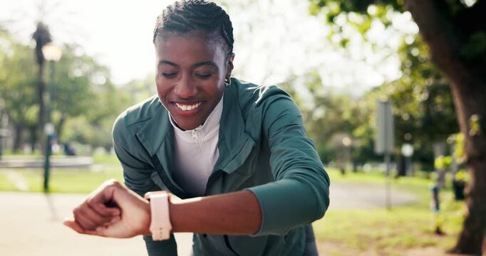 Smart watch, smile or black woman in park for fitness, progress review or cardio check in workout. Digital, happy or athlete with tech, performance monitoring or training track for wellness goals.