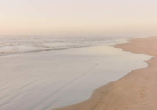 Vast beach and ocean at dusk, Long Beach Peninsula, Washington, USA