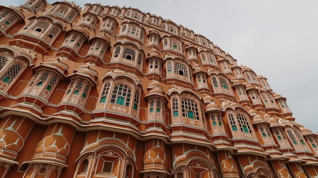 Ornate hawa mahal palace of the winds in jaipur, india, revealing its rajput architecture and jharokha windows
