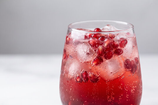 Close Up Iced Pomegranate Sparkling Refresher With Arils