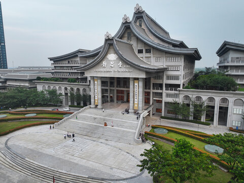 Aerial view of the Yayasan Buddha Tzu Chi Indonesia complex, featuring grand traditional architecture, a stone plaza, and landscaped gardens in Penjaringan, Jakarta, Indonesia.