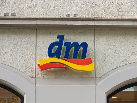 DM Drugstore Signage on Storefront in Urban Area