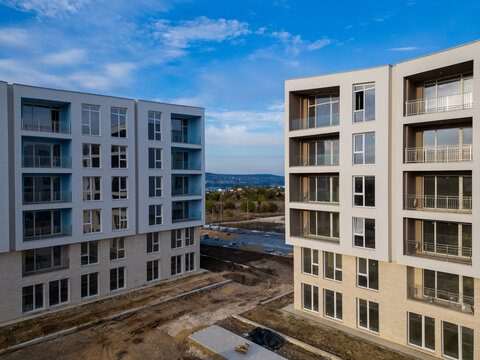Aerial view of new apartment buildings under construction near the sea coast