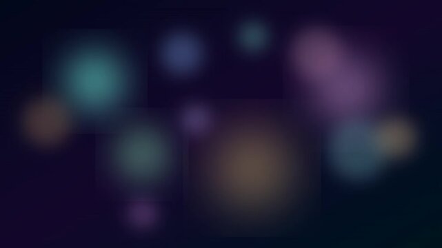 Blurred lights transition across a dark background, creating an abstract atmospheric effect. background blur