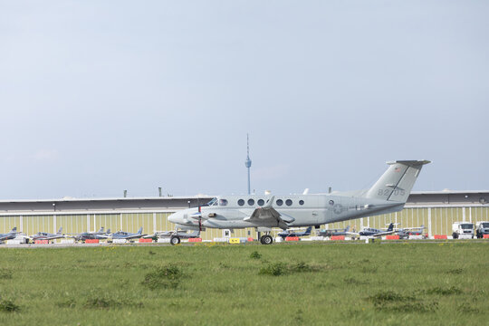 07 October 2026, A United States Marines UC-12W King Air aircraft taxis on the runway at Stuttgart Airport, Stuttgart, Germany.