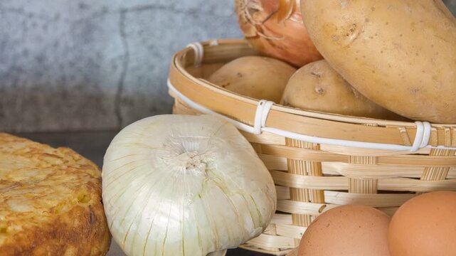potatoes, onions, eggs&mdash;ingredients for potato omelet