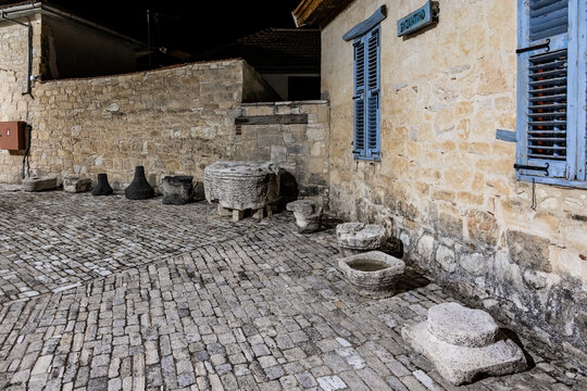 Remains of stone pillars from Byzantine period in courtyard of Timios Stavros Monastery in mountain Omodos village in Cyprus