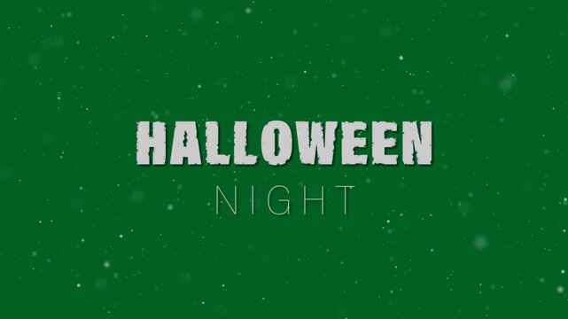 Animaion of halloween text and specs on grey background
