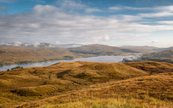 View over the heather moors from the West Highland Way trail towards Loch Tulla near Inveroran in Scotland