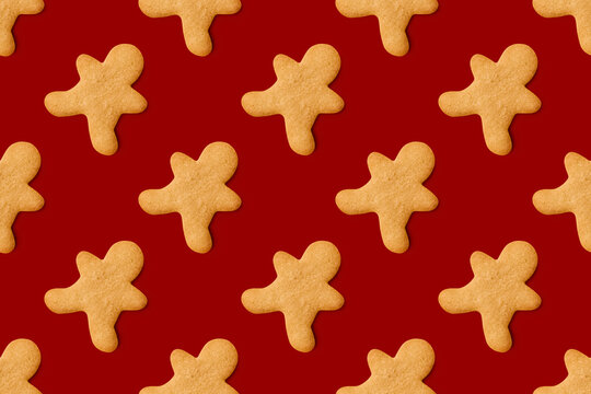 Seamless pattern of gingerbread man cookies 