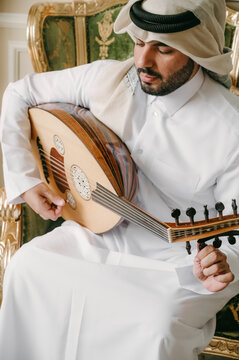 Arab man playing Oud
