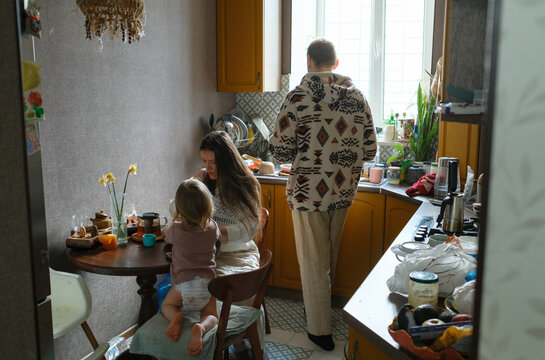 Family spending time together in a cozy kitchen
