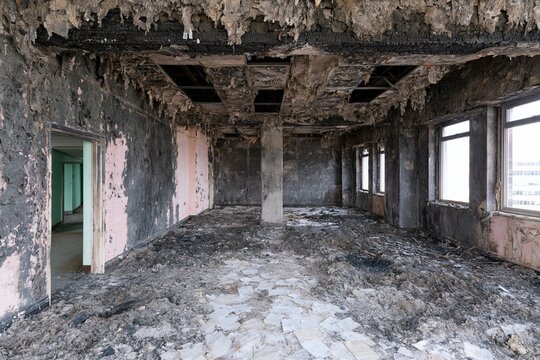 The Burnt and Dilapidated Room Interior of an Abandoned Building