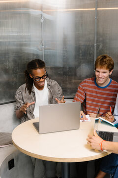 Small business startup team working together in a modern office.