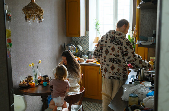 Family spending time together in a cozy kitchen